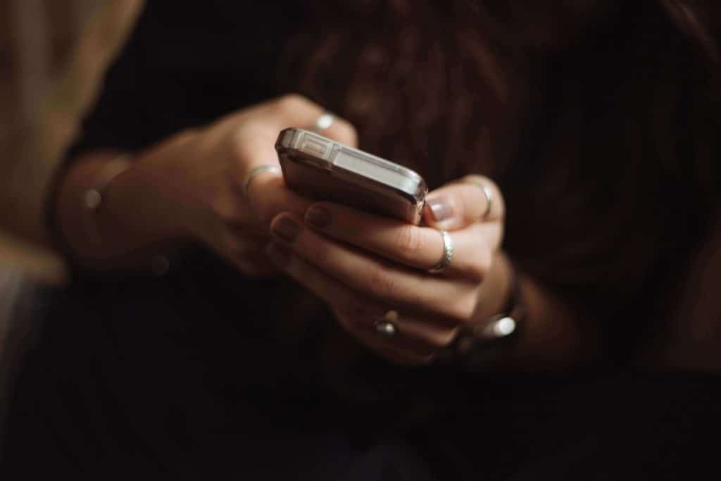 female hands holding a smartphone